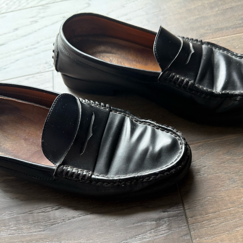 Tod's Black Leather Penny Loafers